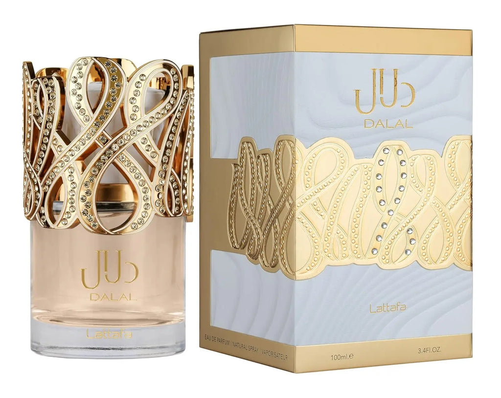 A glass perfume bottle with a decorative gold top and its matching white and gold box.