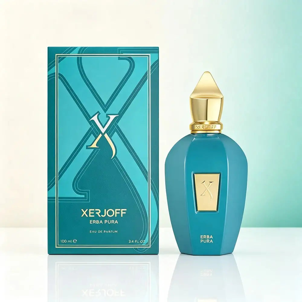 A turquoise perfume bottle next to its matching presentation box on a white surface.