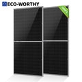 Two black monocrystalline solar panels with silver metal frames