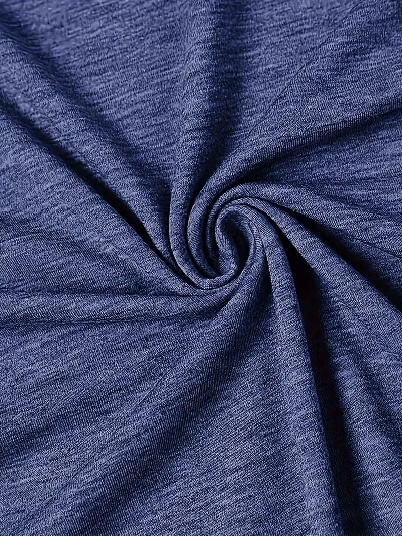 Detailed view of the soft, heathered navy blue fabric texture of a T-shirt