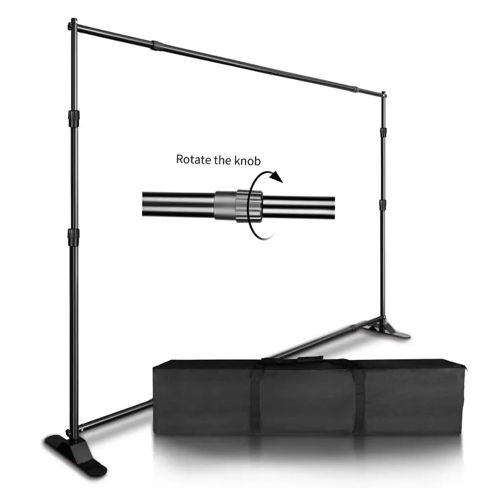 Adjustable black photography backdrop stand with a carrying case and instruction on rotating the knob