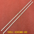 A pair of LED backlight strips with white circuit boards for television repair