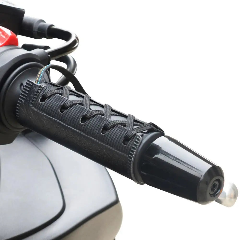 Motorcycle handlebar with a black heated grip cover installed with a lace-up design.