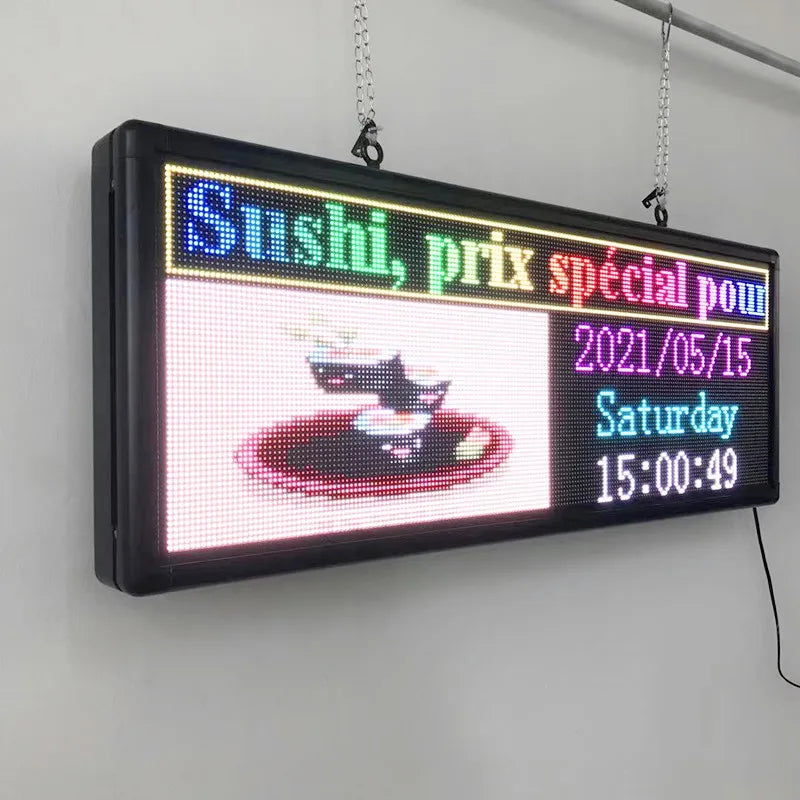 Rectangular programmable LED advertising sign displaying sushi graphic and date time info