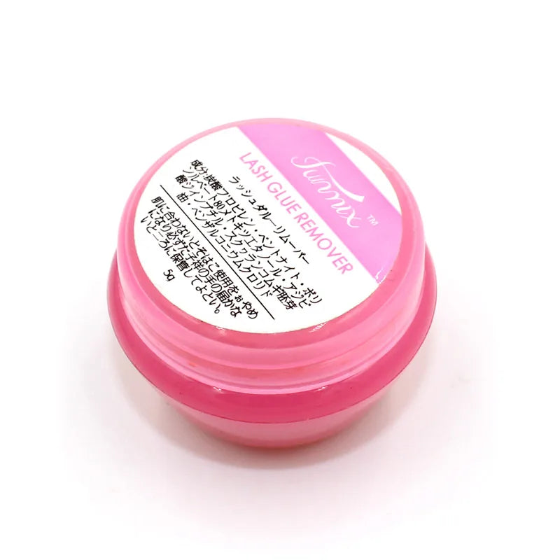 Pink pot of professional eyelash extension glue remover cream