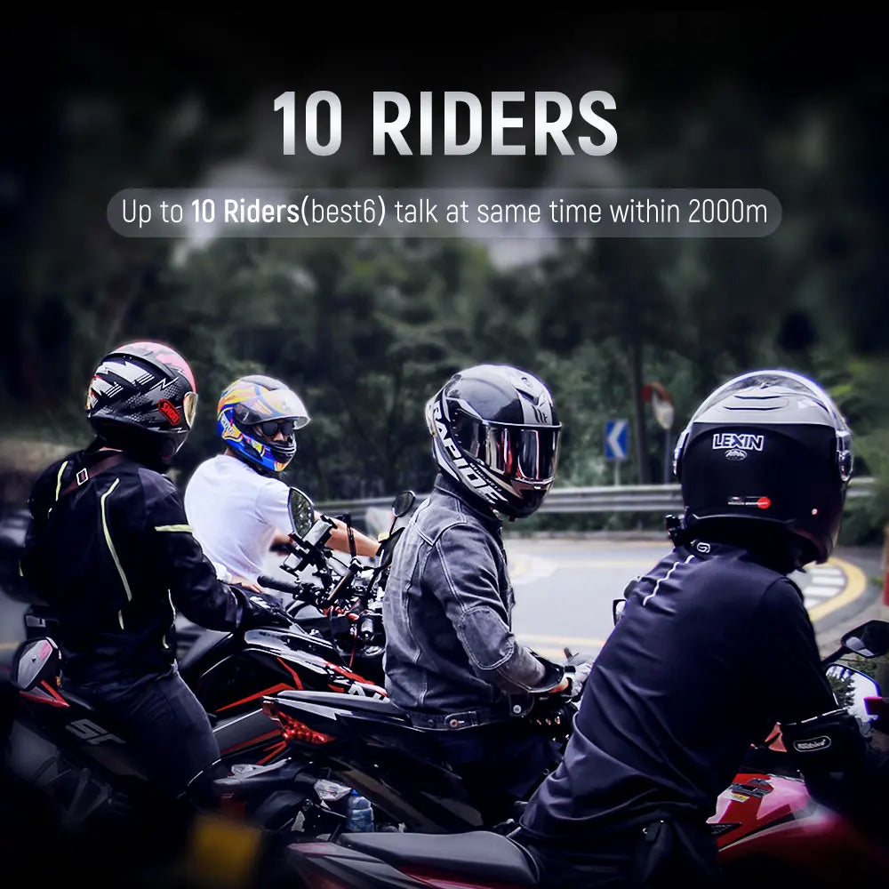 Group of four motorcycle riders in helmets on a mountain road