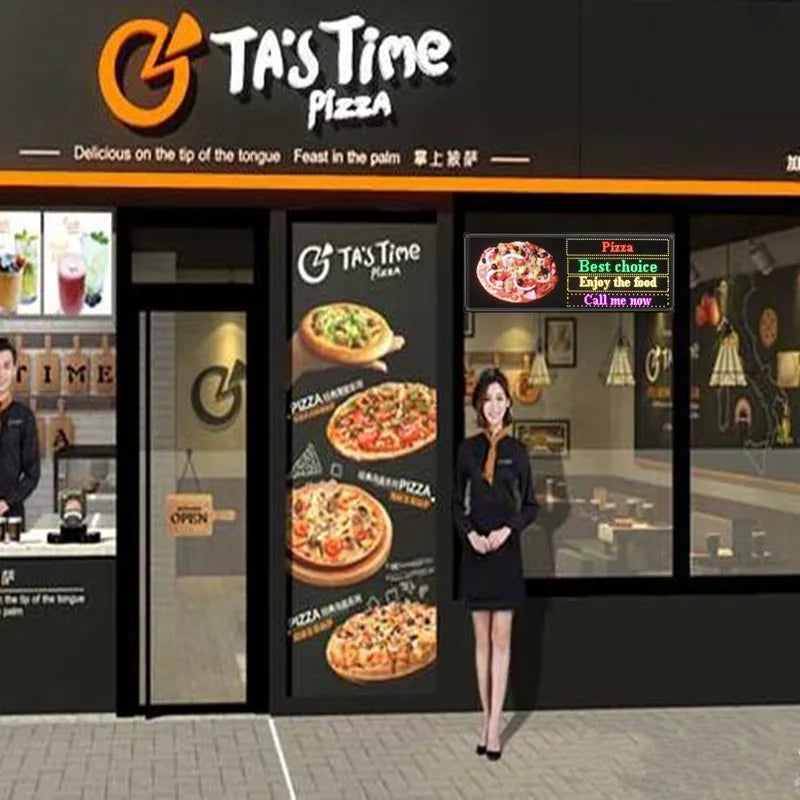 LED sign displayed in a storefront window with pizza menu graphics