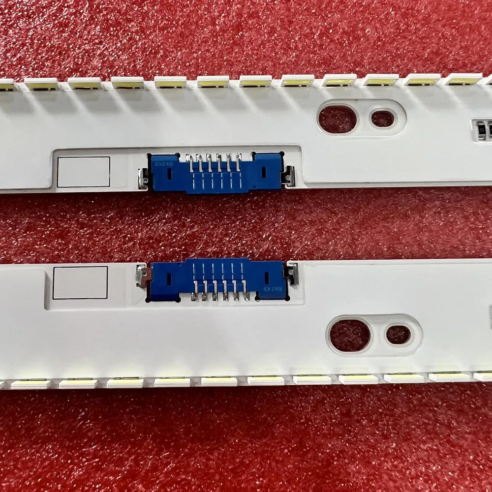 Detail of blue electrical connectors on LED backlight strips