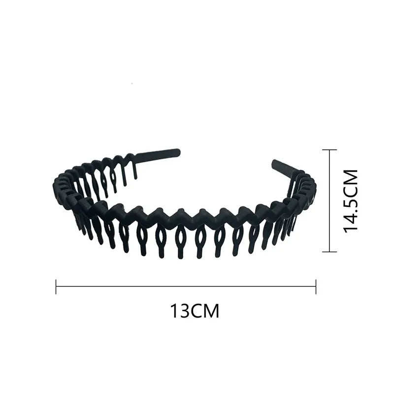 A black wavy toothed headband with measurement labels for length and height