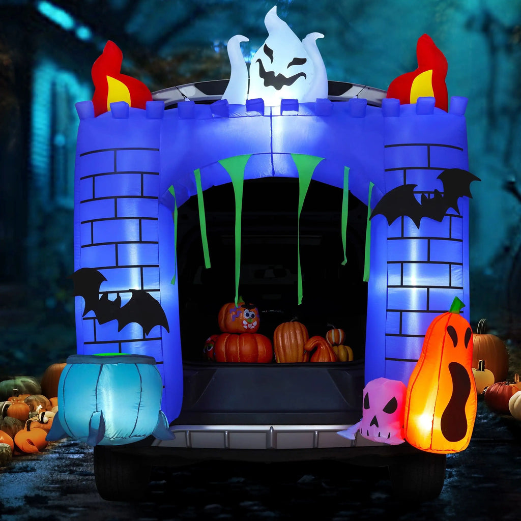 6 ft tall haunted castle Halloween inflatable with built-in LED lights standing on a lawn