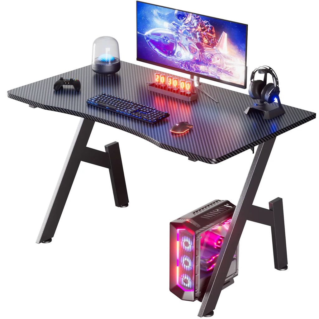 Black carbon fiber gaming desk with gaming PC tower underneath