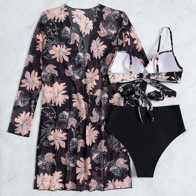 Back view of a black and pink floral bikini set with a long-sleeve mesh cover-up.