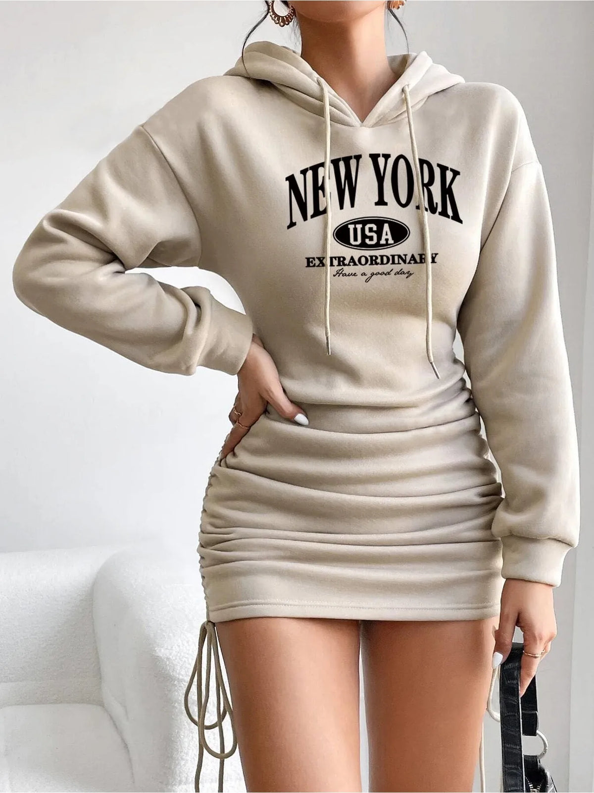 Beige long-sleeve hooded mini dress with New York USA graphic print