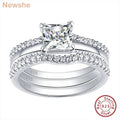 Princess cut cubic zirconia engagement ring set in 925 sterling silver with a matching guard band.