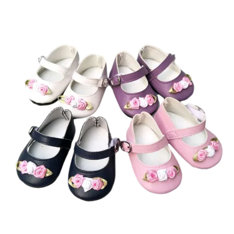 A collection of various colours of decorative doll Mary Jane shoes with rose details