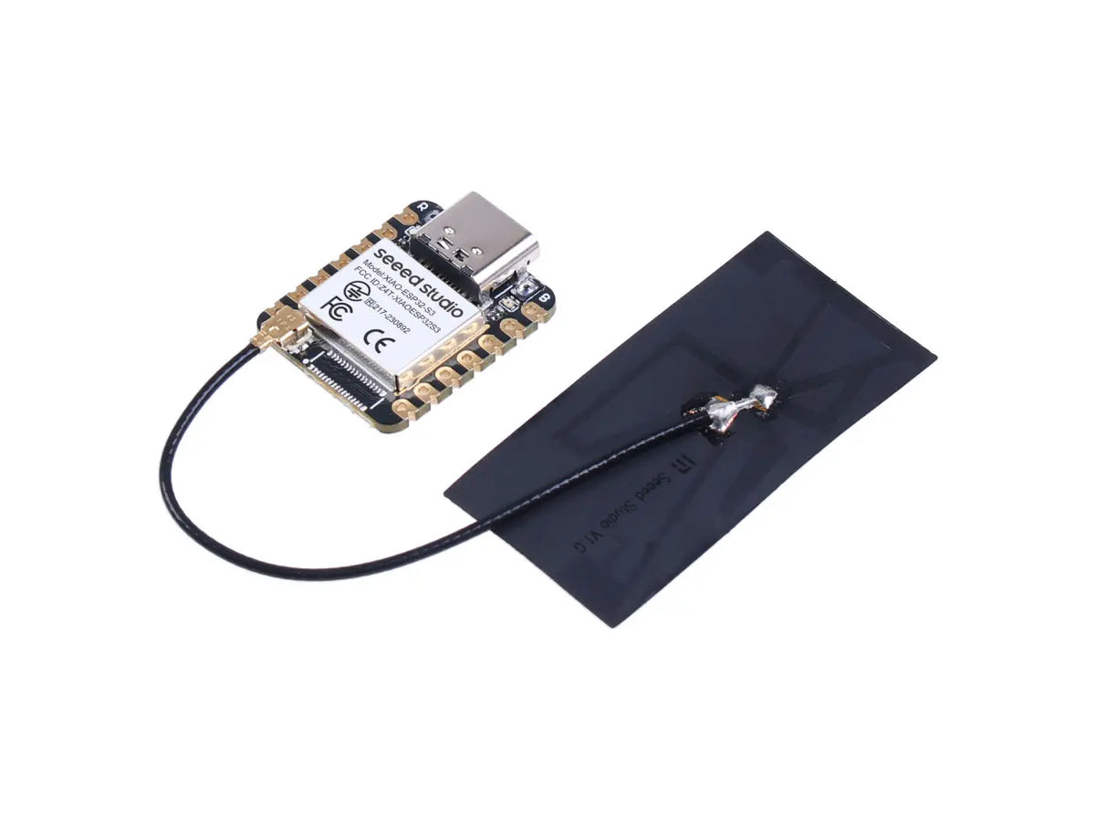 ESP32-S3 microcontroller development board connected to a black rectangular antenna.