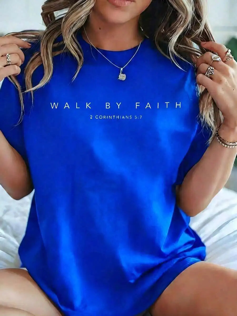 Blue t-shirt with faith-based text design worn by a woman