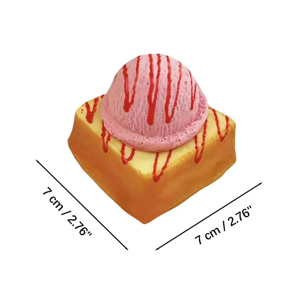 Pink ice cream bread squishy toy with dimension labels in centimeters and inches