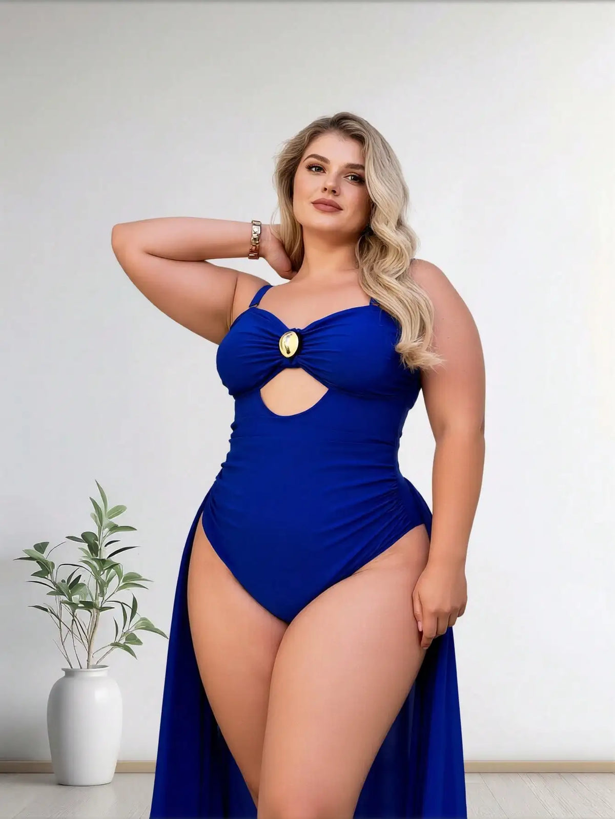 Royal blue one-piece swimsuit with cutout and gold front accent on a model