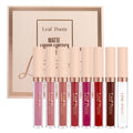 Eight liquid lipsticks arranged in front of their product box.