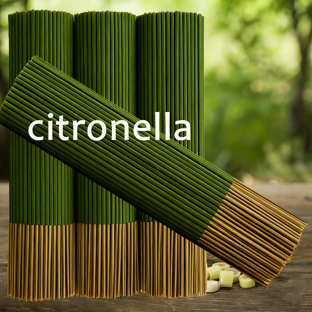 Three bundles of green citronella incense sticks with one bundle angled forward