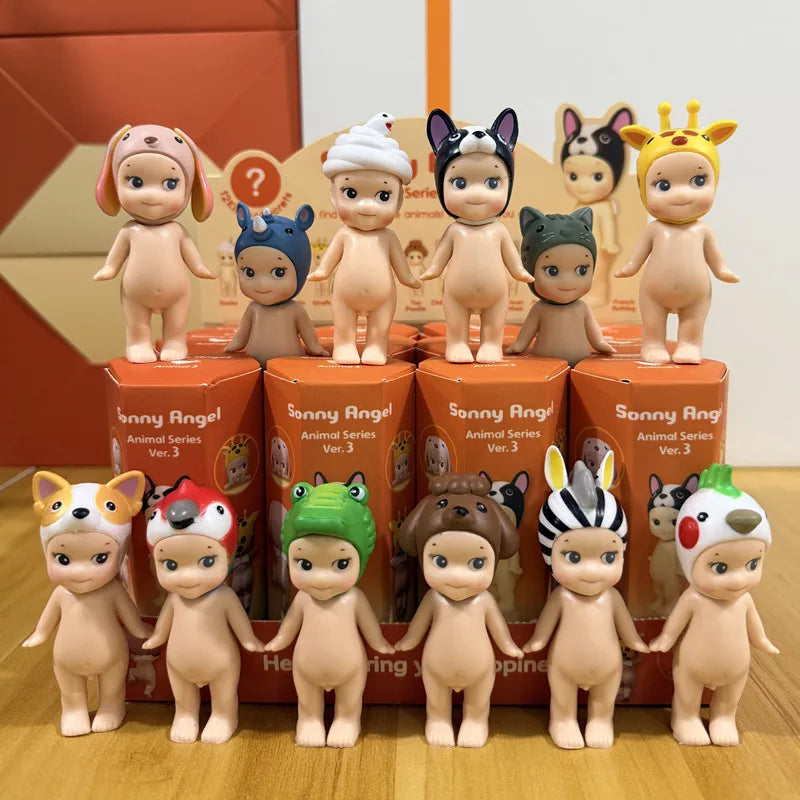 collection of twelve miniature animal-themed figurines standing in front of their orange packaging boxes labeled Animal
