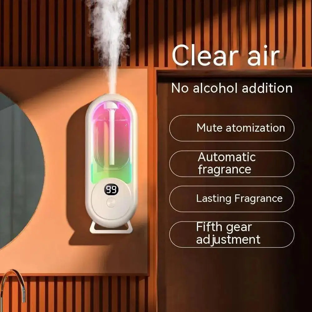 White wall-mounted automatic fragrance diffuser with key features listed as text