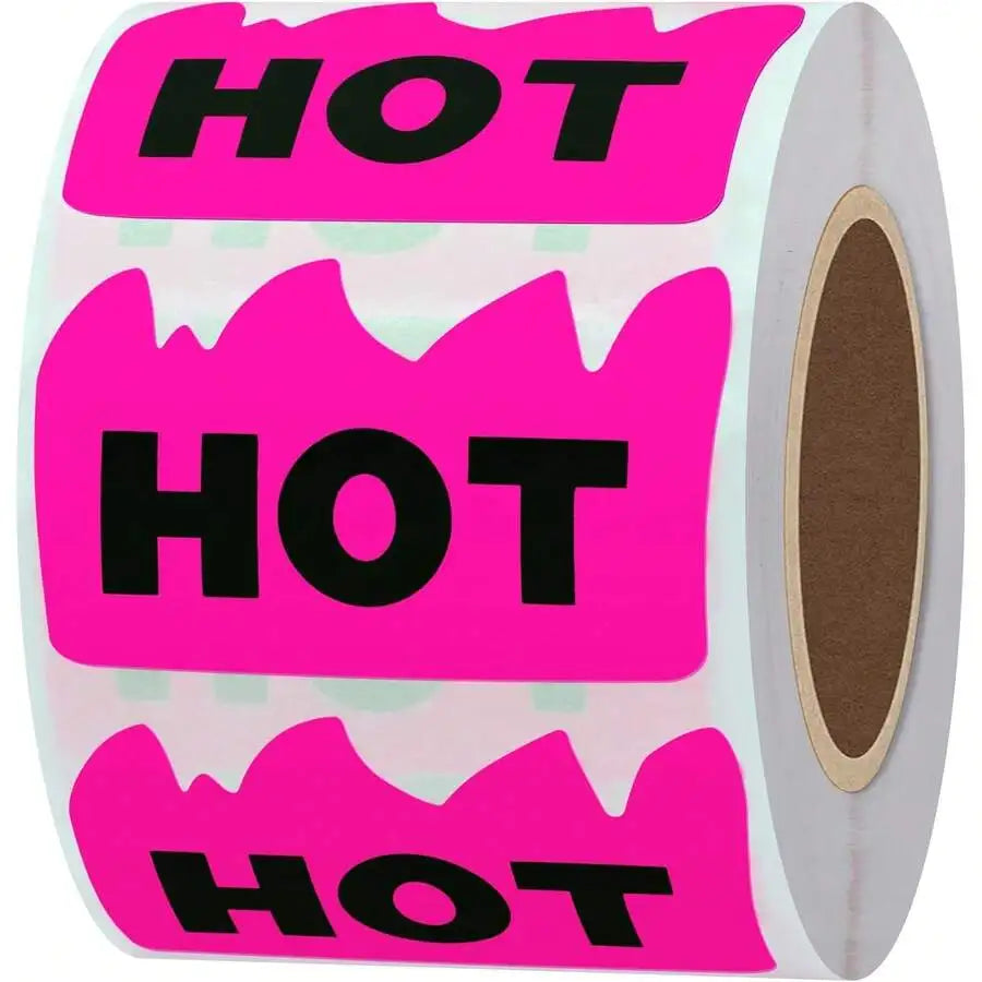 A roll of neon pink adhesive labels shaped like flames with the word HOT printed on them