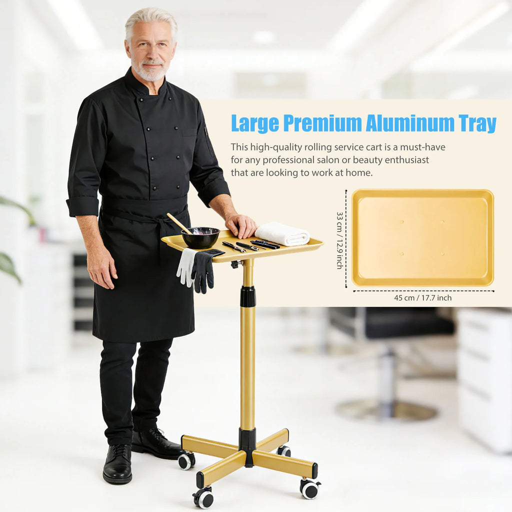 Professional salon technician using a gold rolling service cart with an aluminum tray