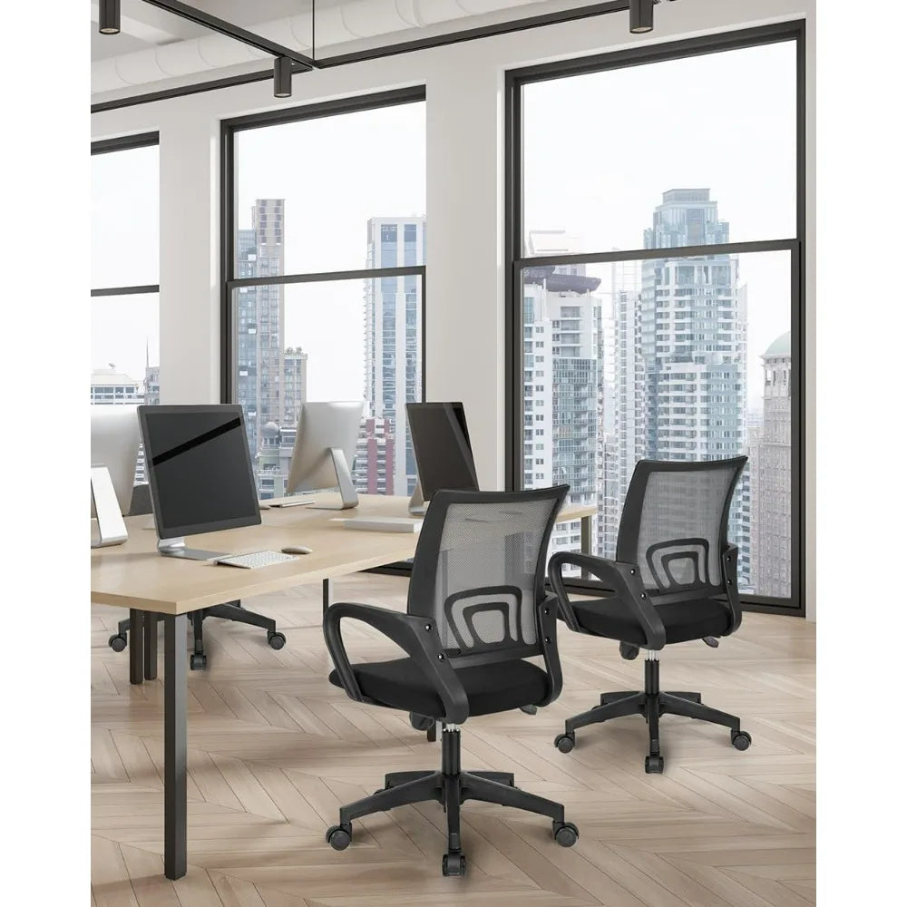 Black mesh office chair in a modern office interior with city skyline view