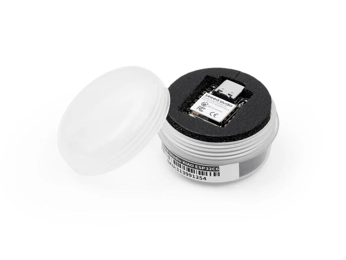 Small development board microcontroller inside a round protective case