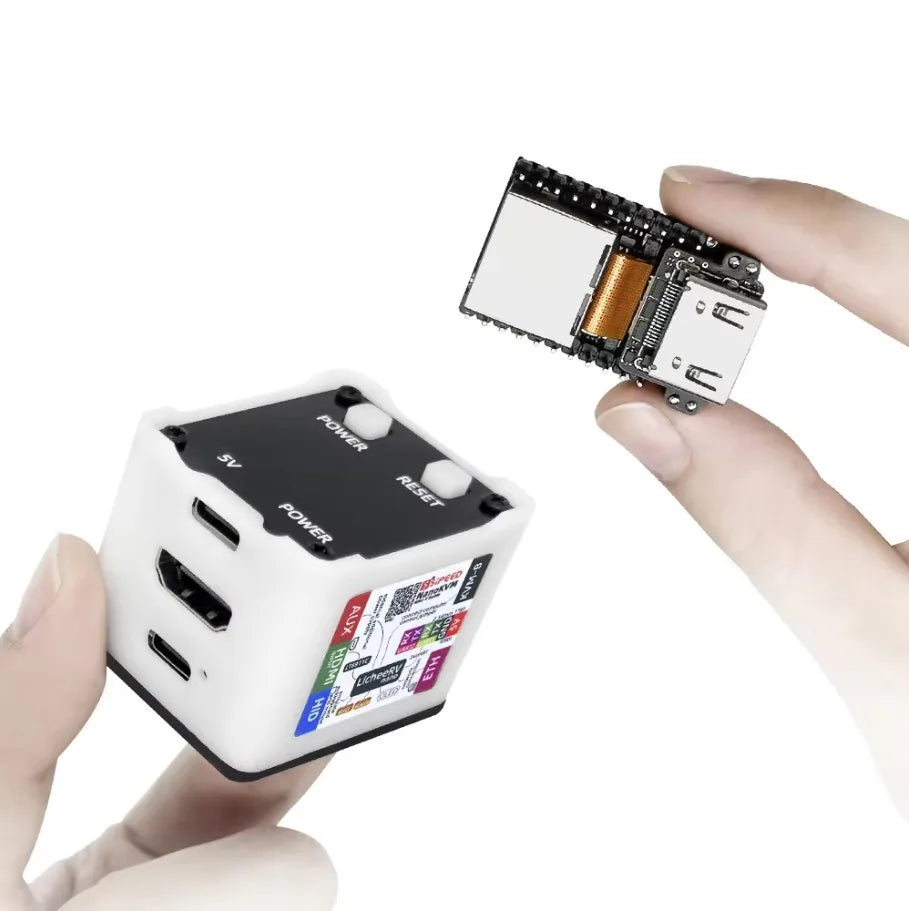 Hands holding a NanoKVM module and internal board
