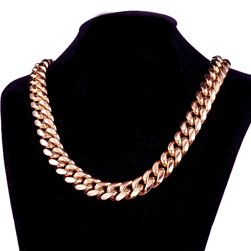 Rose gold tone cuban link chain on a black velvet necklace display bust