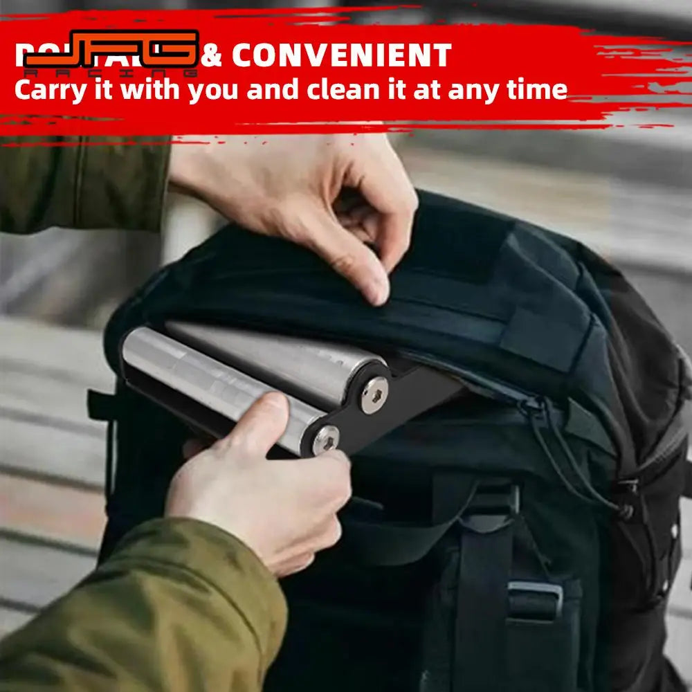 Portable motorcycle wheel cleaning bracket being placed inside a backpack for transport.