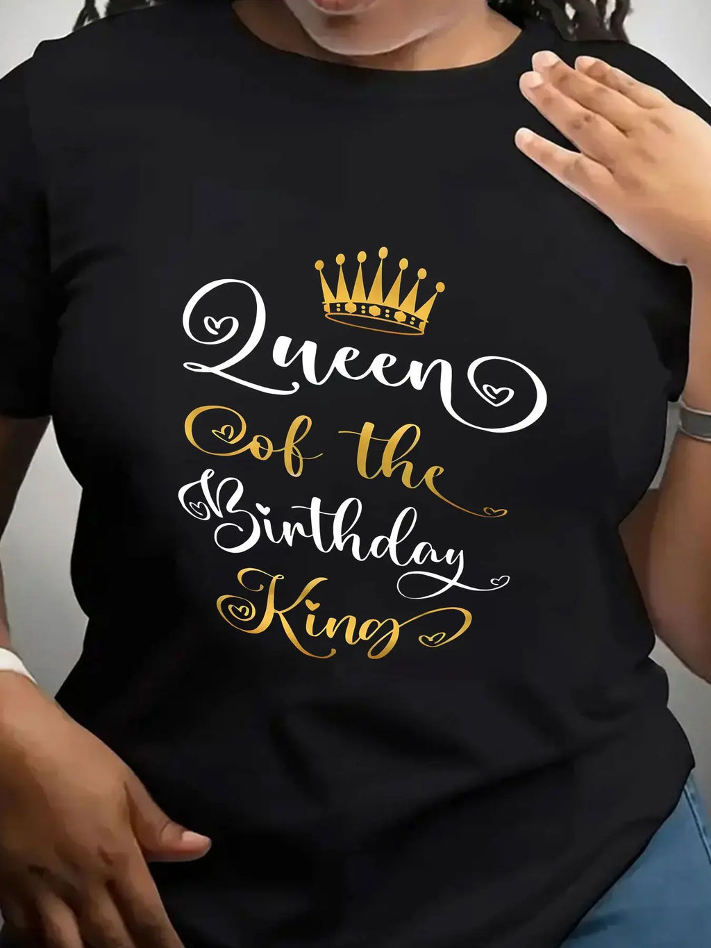 Black crew neck t-shirt for women with gold and white Queen of the Birthday King crown graphic.