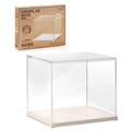 Clear acrylic display box for miniatures with white base, shown with its cardboard packaging
