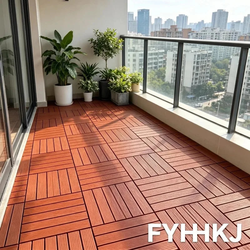 Red interlocking plastic floor tiles on a balcony overlooking city buildings