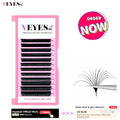 Tray of black self-fanning eyelash extensions with various lengths and tweezers with a fan