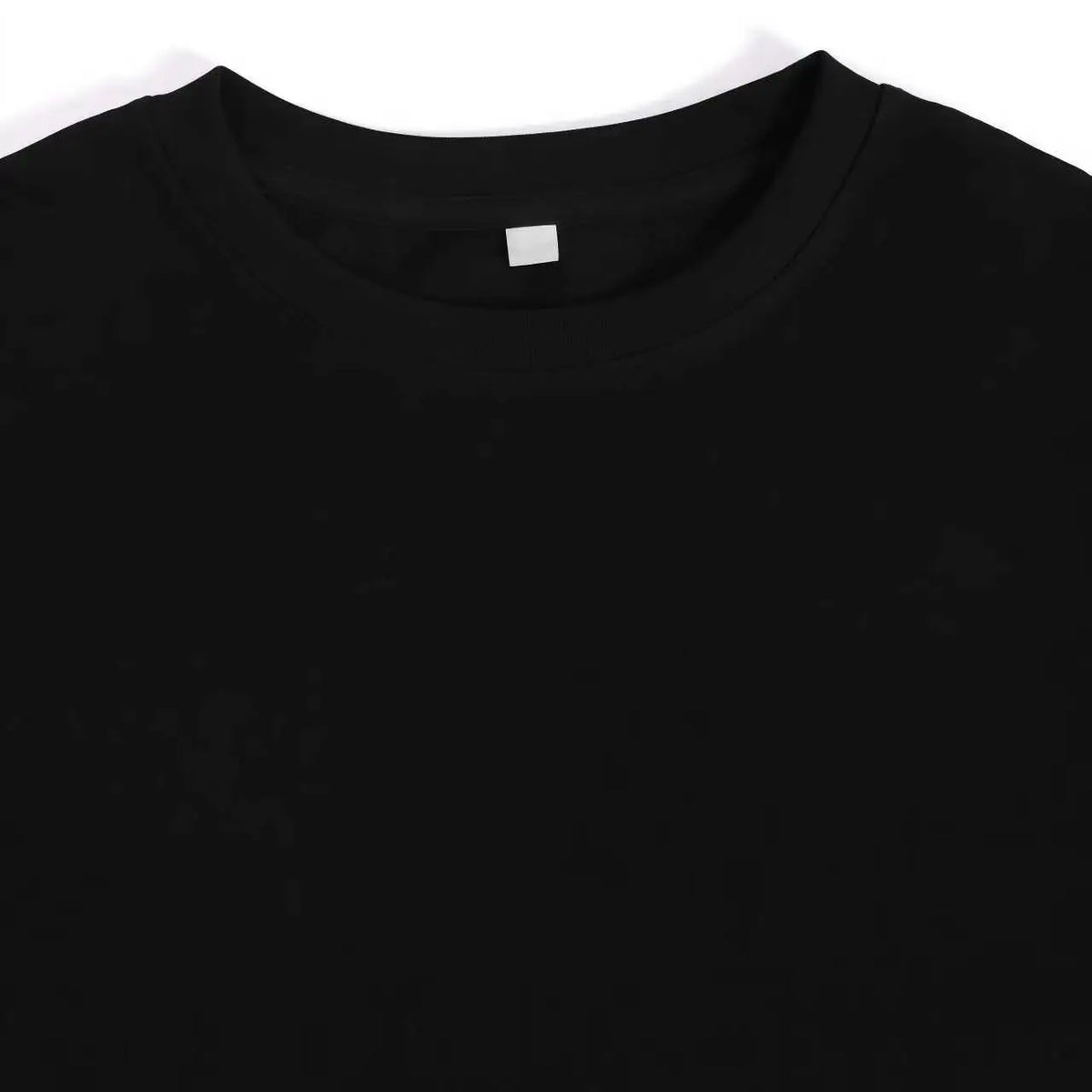 Close-up view of the collar area of a plain black t-shirt.