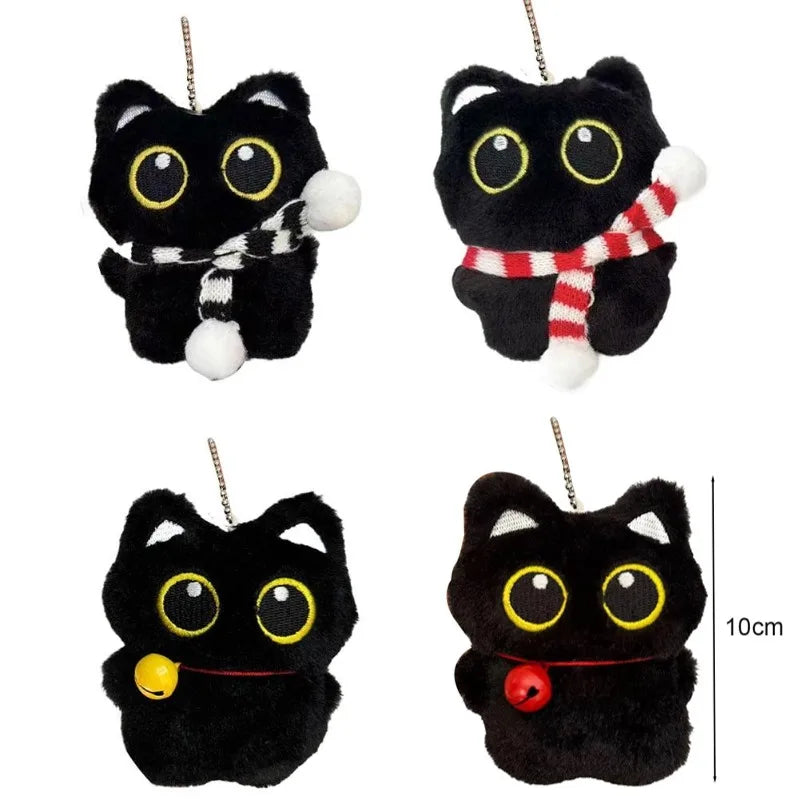 Four black cat plush keychains with various accessories including scarves and bells showing a 10cm size reference.