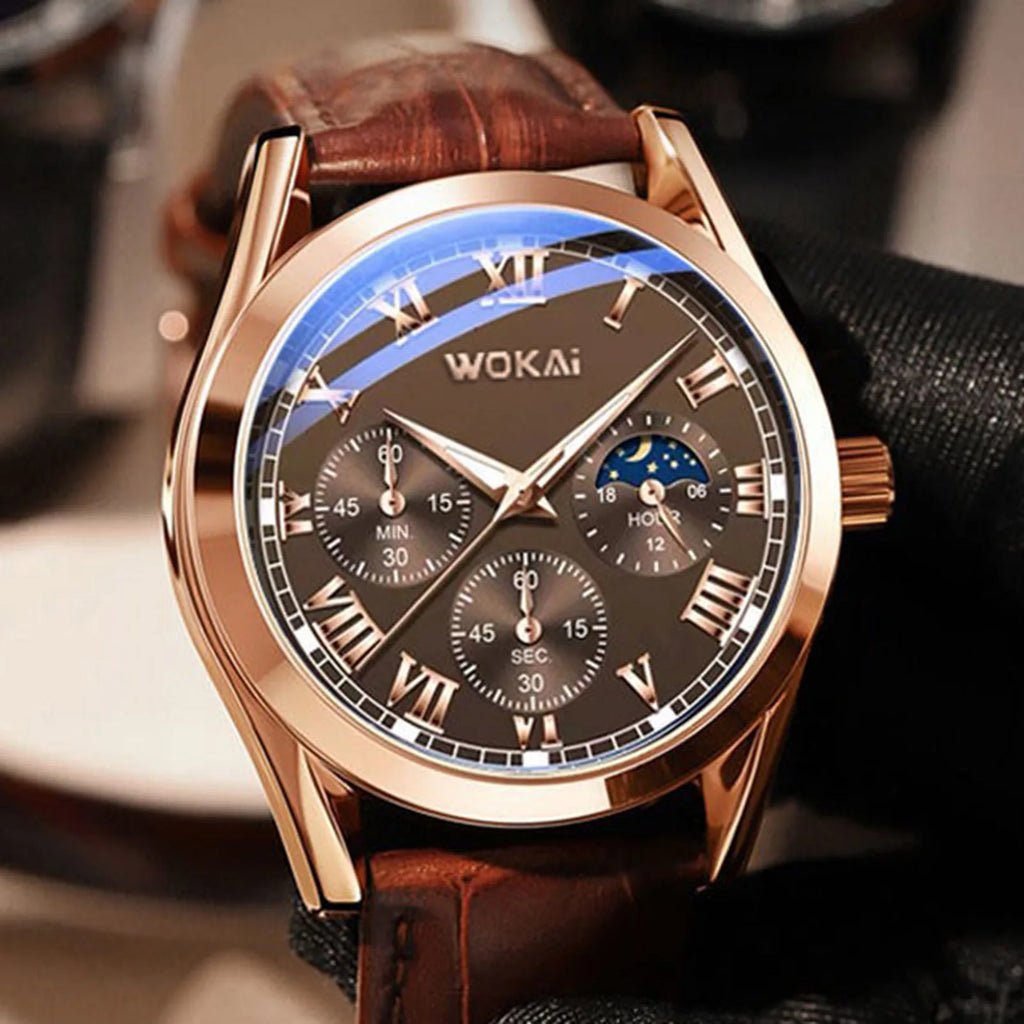 Rose gold tone quartz watch with brown leather strap held by a hand in a glove