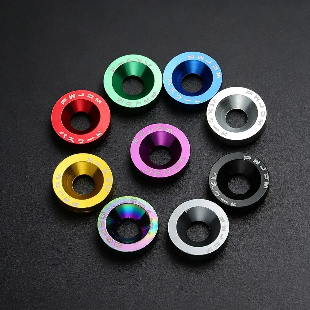 Assorted colors of aluminum concave washers for automotive and scooter use.
