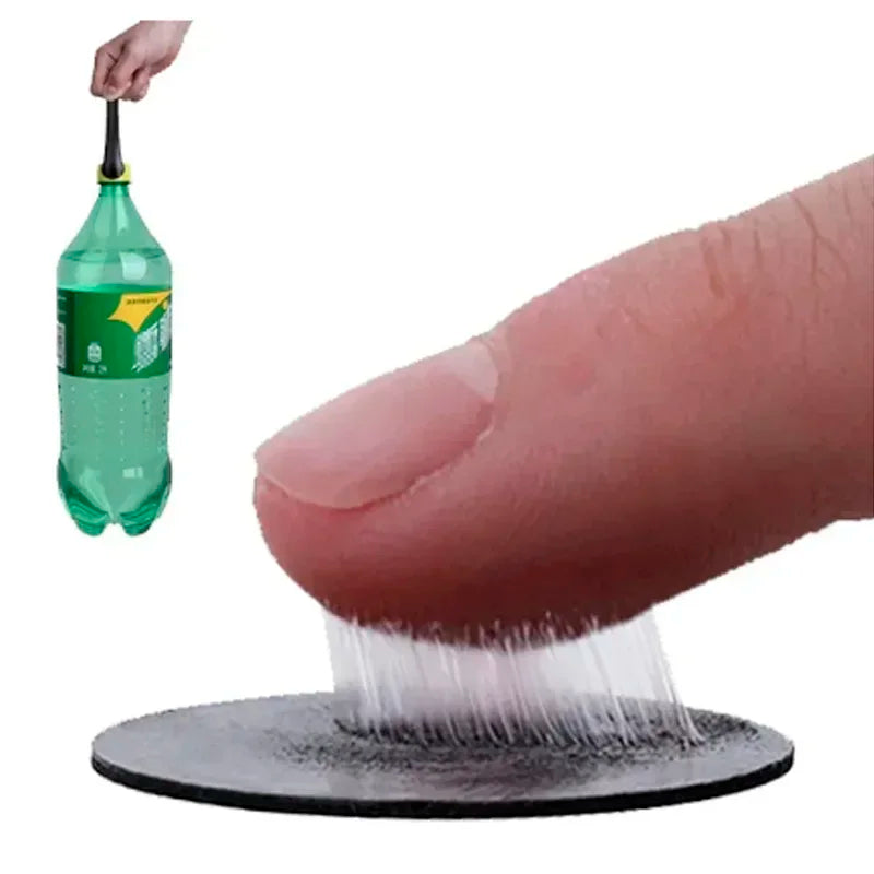 Close-up of a finger holding a strong adhesive bike patch, demonstrating its bonding strength on a bottle.