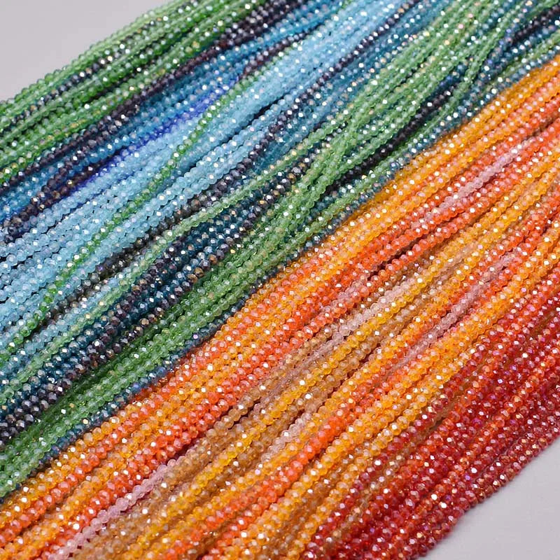 Faceted rondelle crystal glass spacer beads in multiple colors