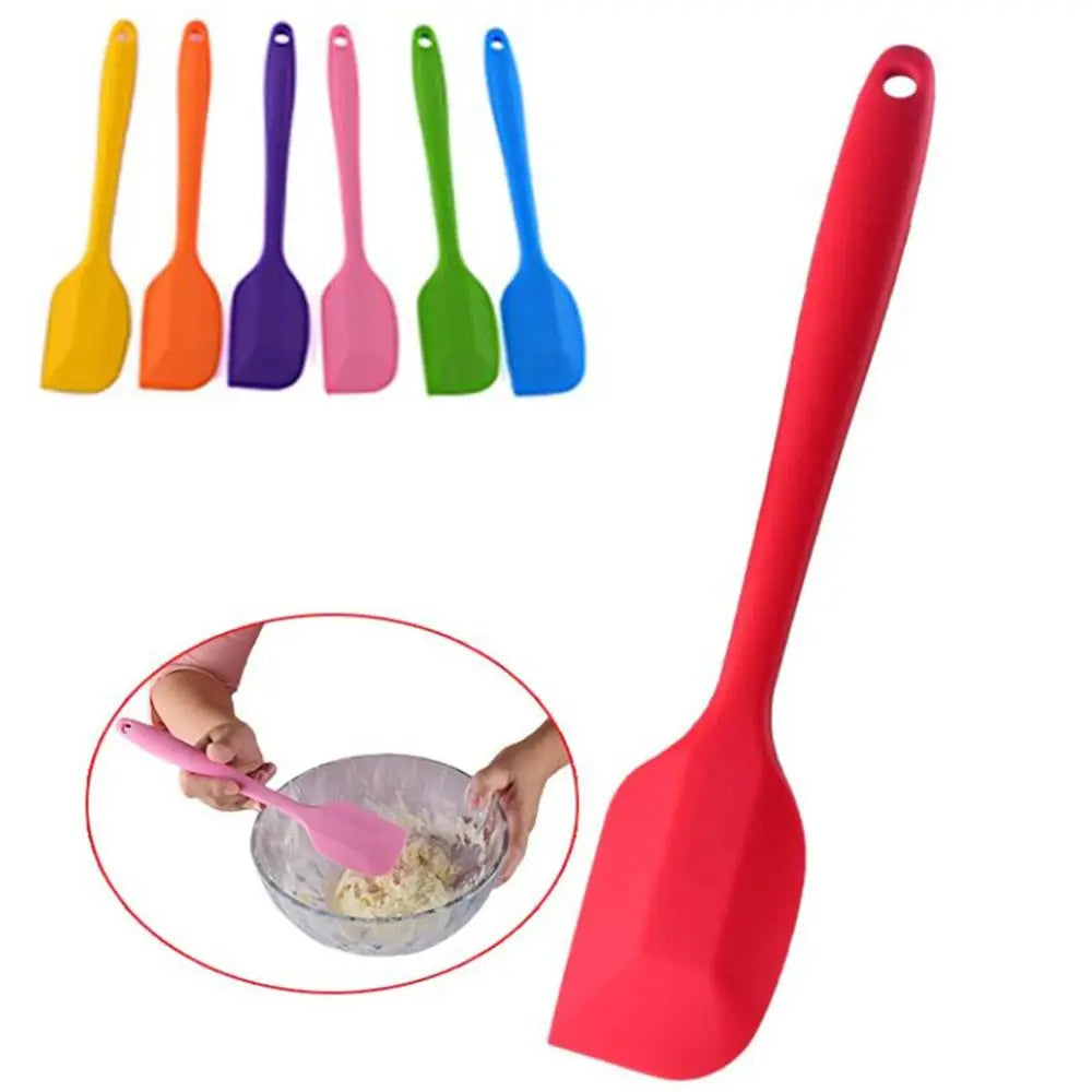 Red silicone spatula shown as the main product with smaller images of other colors and a demonstration of use.
