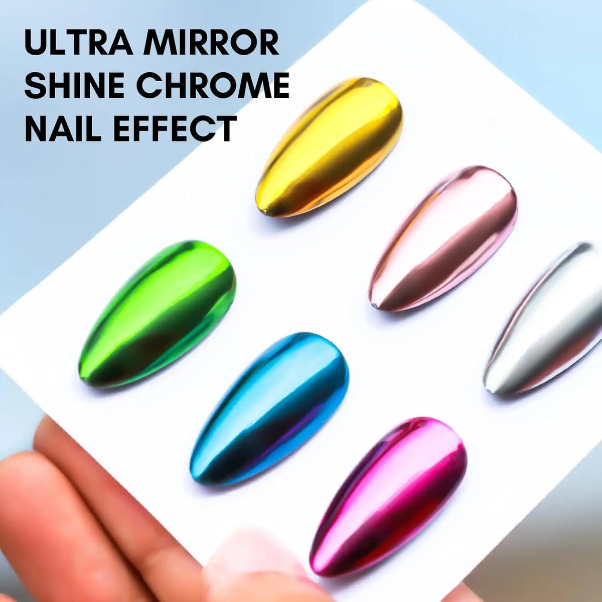 Hand holding sample nails showing various metallic chrome color finishes