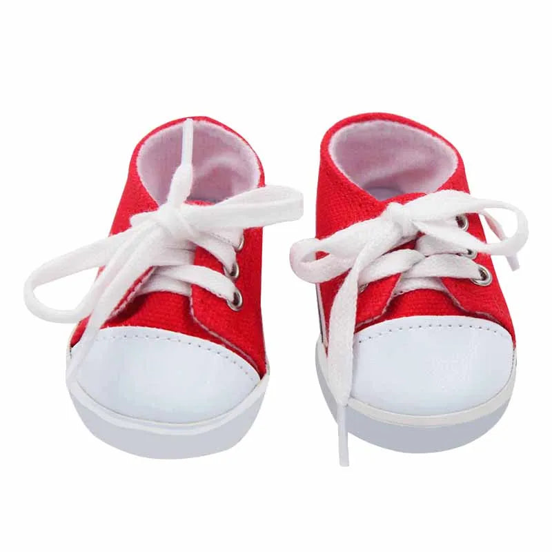Red canvas sneakers with white laces and white toe caps for dolls