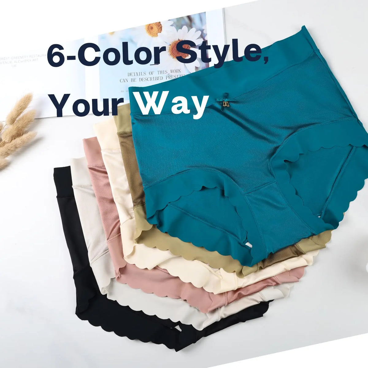 Six pairs of colorful satin panties stacked on top of each other.