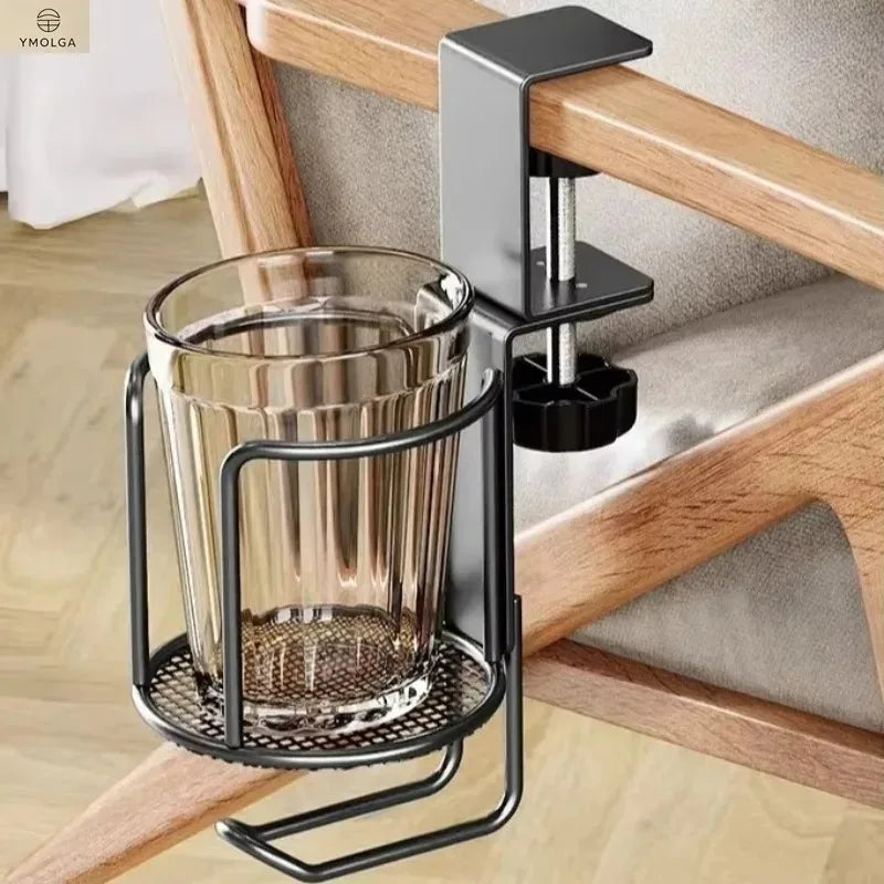 Black metal cup holder clamped onto the wooden armrest of a chair