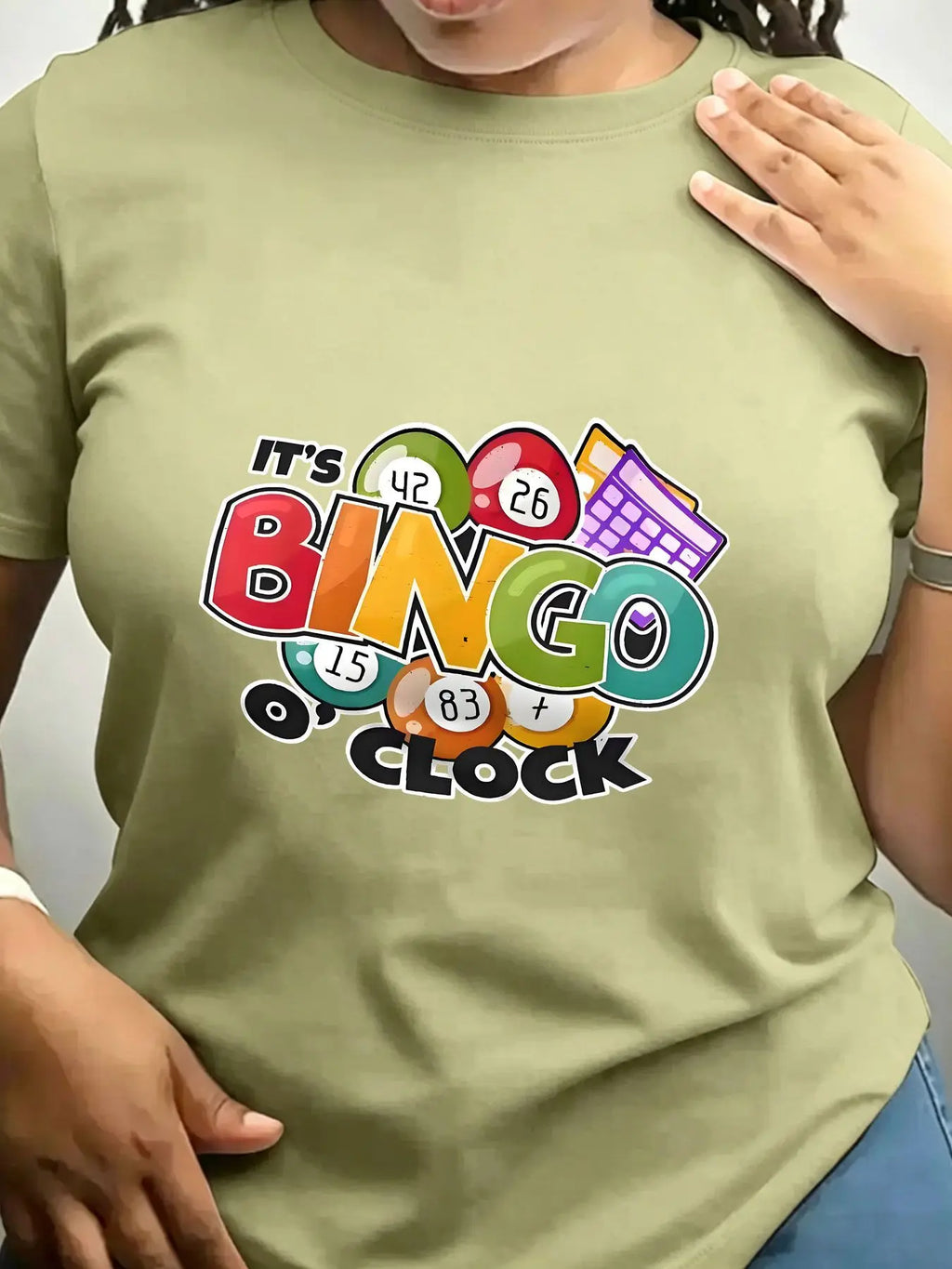 Olive green crew neck t-shirt with colourful bingo-themed graphic on front
